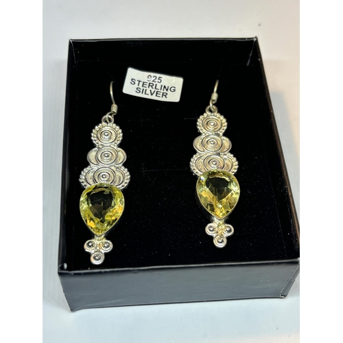 653 - A APIR OF MARKED SILVER DROP EARRINGS WITH CITRINE STONES IN A PRESENTATION BOX