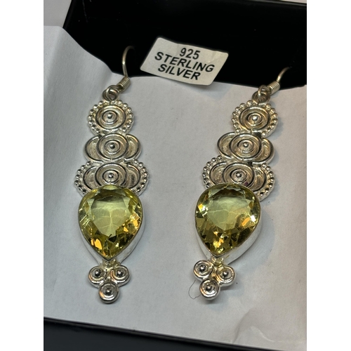 653 - A APIR OF MARKED SILVER DROP EARRINGS WITH CITRINE STONES IN A PRESENTATION BOX