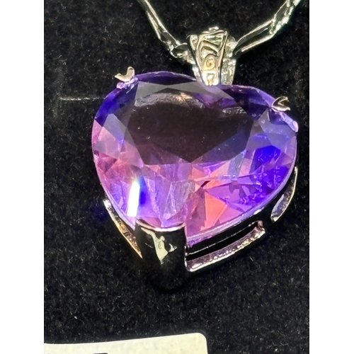 660 - A MARKED SILVER NECKLACE WITH AMETHYST HEART PENDANT IN A PRESNTATION BOX