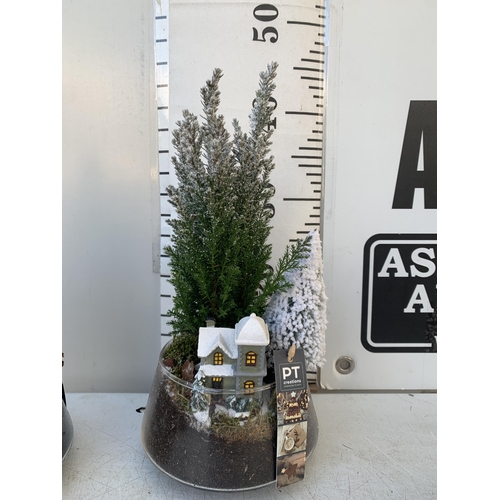 13 - FOUR CHRISTMAS SNOW SCENE GLASS BOWLS FILLED WITH CYPRESS CONIFERS AND CHRISTMAS ACCESSORIES. BOWLS ... 