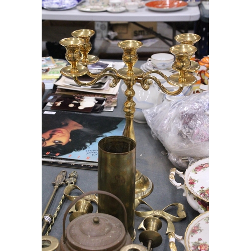 300 - A QUANTITY OF BRASSWARE, ETC TO INCLUDE A PAIR OF WALL SCONCES, A LARGE TRENCH ART VASE, CANDLEABRA,... 