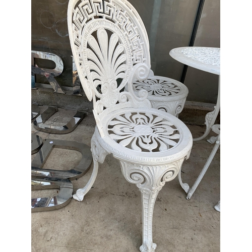 1514 - A CAST ALLOY GARDEN BISTRO SET COMPRISING OF A ROUND TABLE AND FOUR CHAIRS