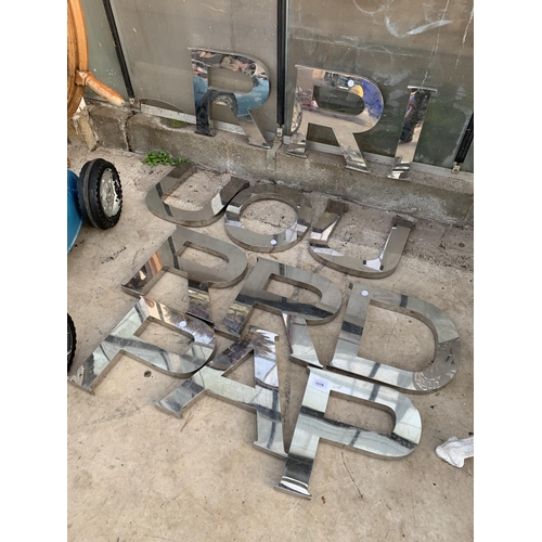 1516 - AN ASSORTMENT OF STAINLESS STEEL SIGN MAKING LETTERS