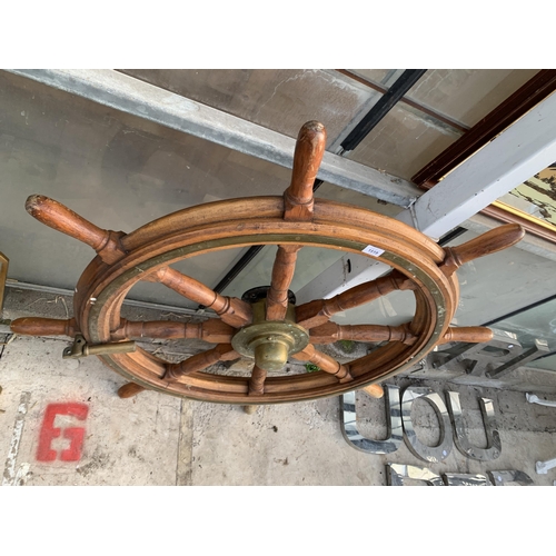 1519 - A LARGE VINTAGE WOODEN SHIPS WHEEL WITH BRASS TRIM AND FITTINGS (D:123CM)