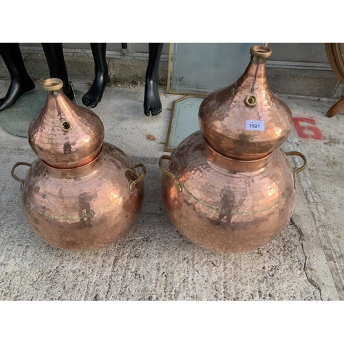 1521 - A NEAR PAIR OF GRADUATED COPPER AND BRASS BREWERY MAKING STILLS