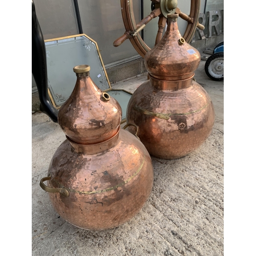 1521 - A NEAR PAIR OF GRADUATED COPPER AND BRASS BREWERY MAKING STILLS