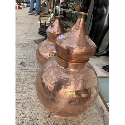 1521 - A NEAR PAIR OF GRADUATED COPPER AND BRASS BREWERY MAKING STILLS