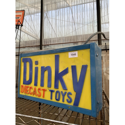 1545 - A DINKY DIECAST TOYS ILLUMINATED SIGN, HEIGHT 24CM, WIDTH 41CM, DEPTH 11CM