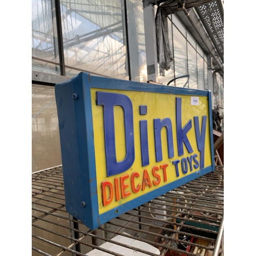 1545 - A DINKY DIECAST TOYS ILLUMINATED SIGN, HEIGHT 24CM, WIDTH 41CM, DEPTH 11CM