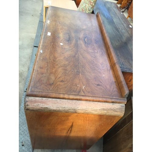 2601 - AN ART DECO WALNUT SIDEBOARD WITH RAISED BACK, TWO DRAWERS AND TWO CUPBOARDS, 46