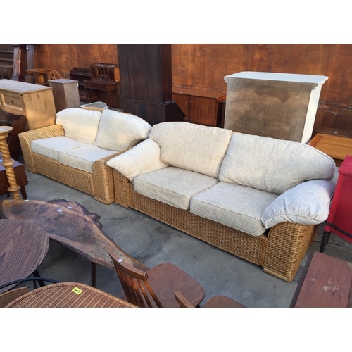 2606 - A WICKER THREE SEATER SETTEE AND MATCHING TWO SEATER SETTEE