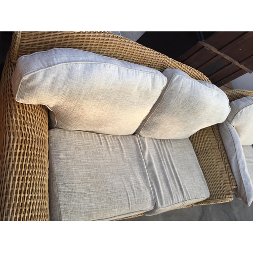 2606 - A WICKER THREE SEATER SETTEE AND MATCHING TWO SEATER SETTEE