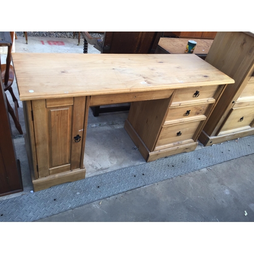 2609 - A MEXICAN PINE KNEE HOLE DESK, 57