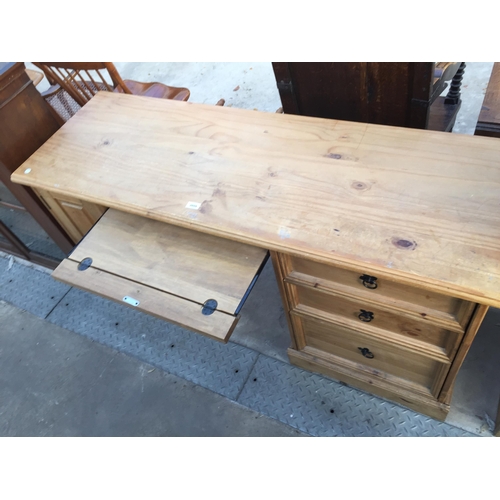 2609 - A MEXICAN PINE KNEE HOLE DESK, 57