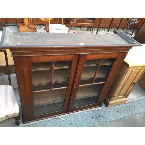 2610 - A LATE VICTORIAN OAK TWO DOOR BOOKCASE TOP, 46