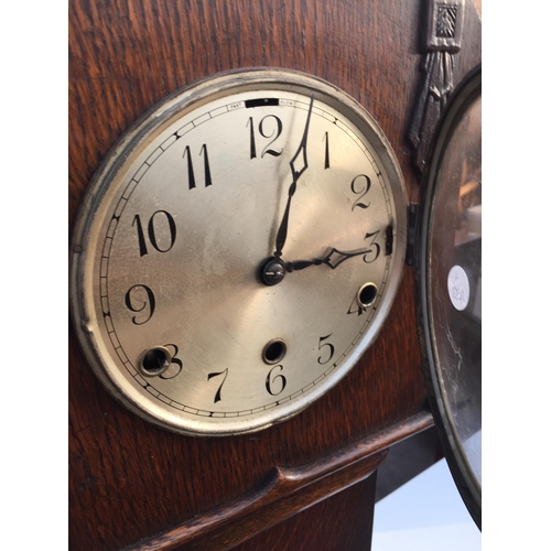 2614 - AN EARLY 20TH CENTURY OAK GRANDMOTHER CLOCK WITH ANVIL MOVEMENT