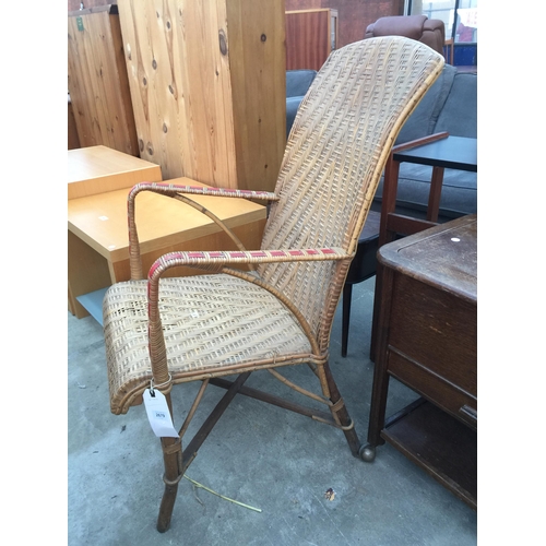 2679 - A RATTAN HIGH BACK ARMCHAIR