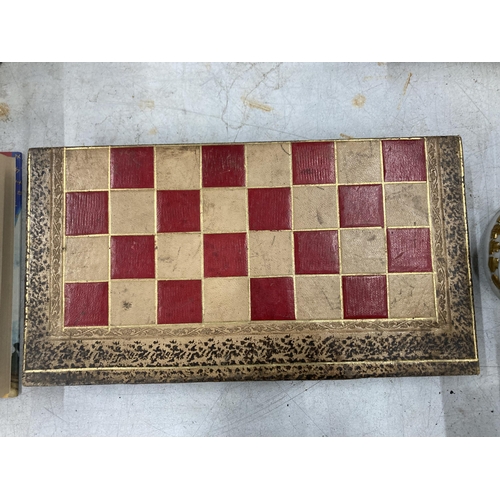 15 - A VINTAGE CHESS, DRAUGHTS, BACKGAMMON BOX BOARD WITH A QUANTITY OF VARIOUS COUNTERS, SHAKERS, DICE E... 