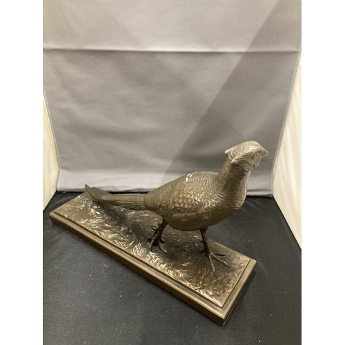 17 - A BRONZE EFFECT PHEASANT FIGURE ON A PLINTH