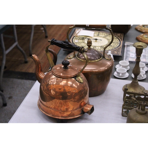 233 - TWO VINTAGE COPPER KETTLES TO INCLUDE ONE ON BUN FEET