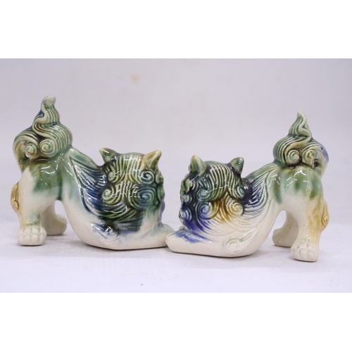 251 - A PAIR OF ORIENTAL FOO DOGS