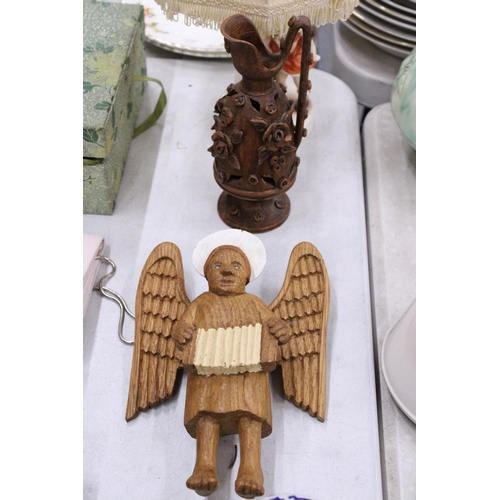 273 - A GLAZED POTTERY JUG AND A WOODEN ANGEL