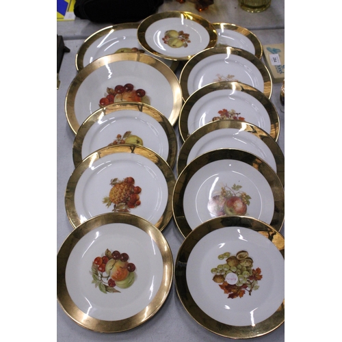 285 - THIRTEEN GILT RIMMED PLATES WITH FRUIT PATTERN DESIGN TO THE CENTRE