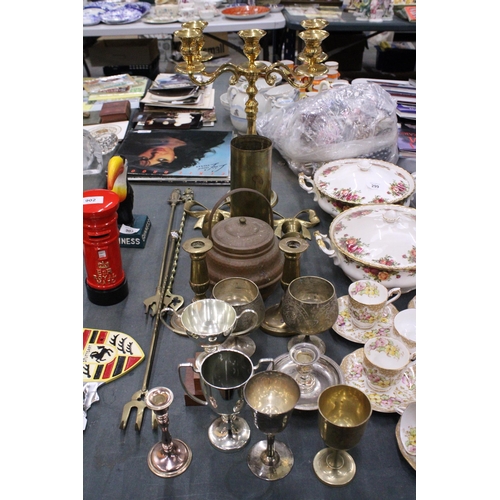 300 - A QUANTITY OF BRASSWARE, ETC TO INCLUDE A PAIR OF WALL SCONCES, A LARGE TRENCH ART VASE, CANDLEABRA,... 