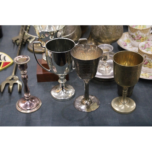 300 - A QUANTITY OF BRASSWARE, ETC TO INCLUDE A PAIR OF WALL SCONCES, A LARGE TRENCH ART VASE, CANDLEABRA,... 