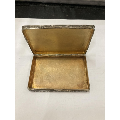 35 - A 19TH CENTURY RECTANGUALR SNUFF BOX WITH FOLIATE SCROLLS HAVING A GOLD CENTRAL PANEL EMBOSSED WITH ... 