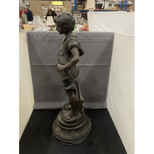 59 - A BRONZE EFFECT FIGURINE OF A BOY ON A PLINTH HEIGHT 47CM