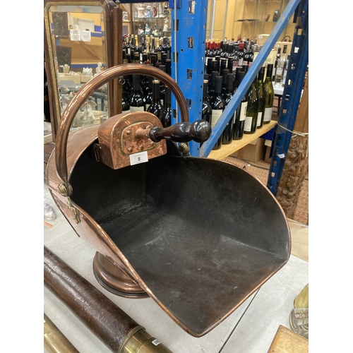 8 - A LARGE COPPER AND BRASS COAL SCUTTLE AND INTEGRATED SHOVEL