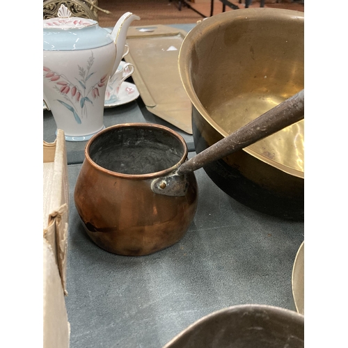 89 - FOUR VARIOUS VINTAGE BRASS AND COPPER PANS