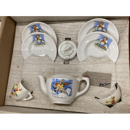 90 - A 1950'S CHILDS BOXED AMERSHAM NURSERY RHYME TEASET COMPRISING OF FOUR CUPS AND SAUCERS, TEAPOT, MIL... 