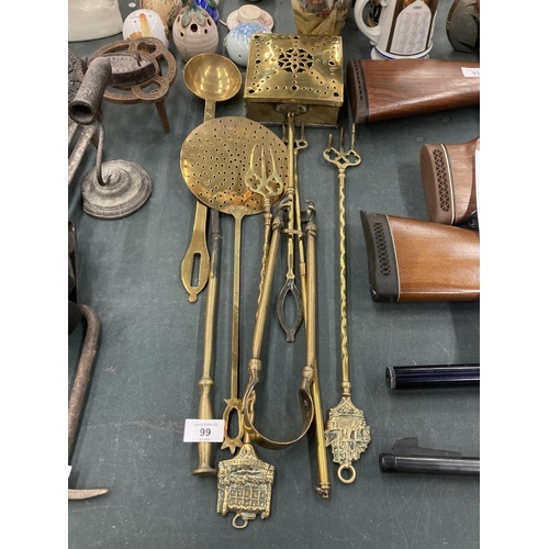 99 - VARIOUS BRASS ITEMS TO INCLUDE A CHESTNUT ROASTER, MILK SKIMMER, TOASTING FORKS, SCOOP ETC