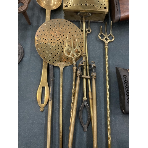 99 - VARIOUS BRASS ITEMS TO INCLUDE A CHESTNUT ROASTER, MILK SKIMMER, TOASTING FORKS, SCOOP ETC