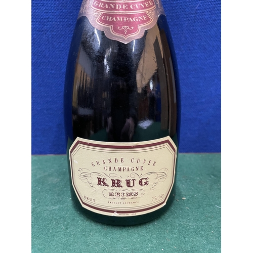 553 - A BOTTLE OF KRUG GRAND CUVEE CHAMPAGNE REIMS