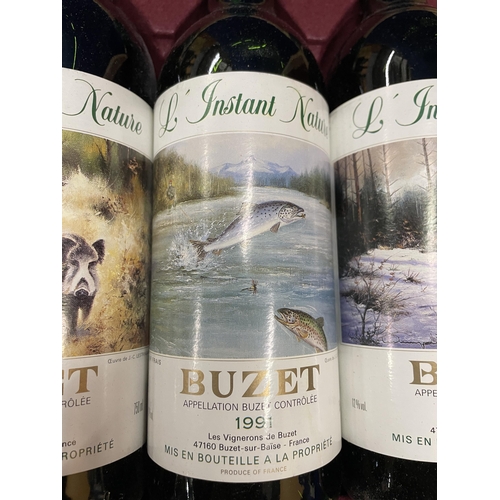 555 - A WOODEN CASE CONTAINING THREE BOTTLES L INSTANT NATURE GRAND VIN DE BUZET