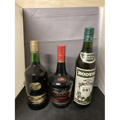 571 - THREE BOTTLES TO INCLUDE A BOOTHS DRY VERMOUTH, TIA MARIA AND A NUY MUSKADEL