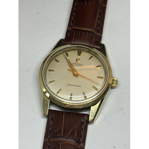 603 - AN OMEGA AUTOMATIC SEAMASTER WRIST WATCH WITH OMEGA LEATHER STRAP