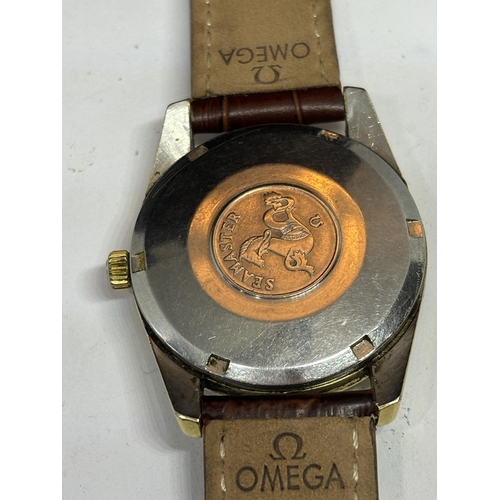 603 - AN OMEGA AUTOMATIC SEAMASTER WRIST WATCH WITH OMEGA LEATHER STRAP