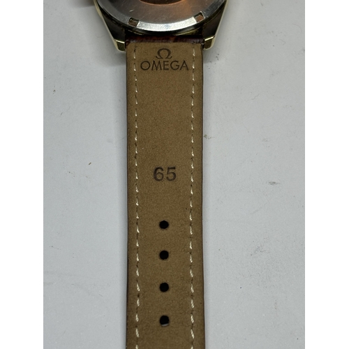 603 - AN OMEGA AUTOMATIC SEAMASTER WRIST WATCH WITH OMEGA LEATHER STRAP