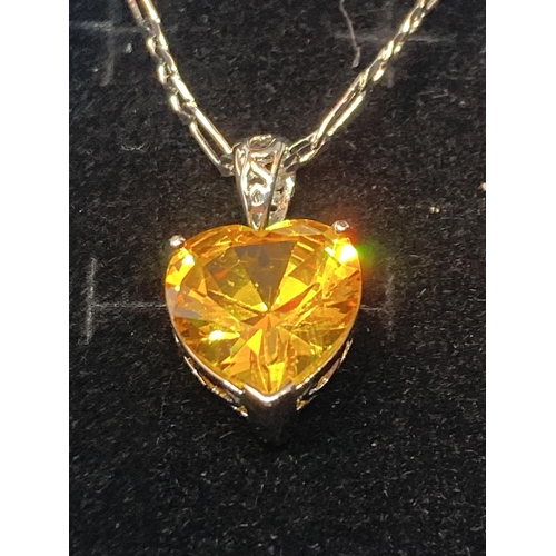 687 - A AMRKED SILVER NECKLACE WITH CITRINE HEART PENDANT IN A PRESENTATION BOX