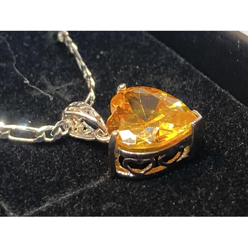 687 - A AMRKED SILVER NECKLACE WITH CITRINE HEART PENDANT IN A PRESENTATION BOX