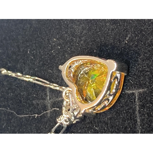 687 - A AMRKED SILVER NECKLACE WITH CITRINE HEART PENDANT IN A PRESENTATION BOX