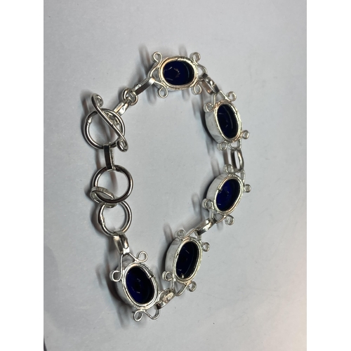 688 - A MARKED SILVER BRACELET WITH BLUE STONES IN A PRESENTATION BOX