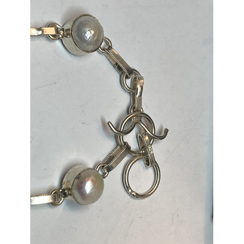 690 - A MARKED SILVER BRACELET WITH PEARLISED AND NATURAL STONES IN A PRESENTATION BOX