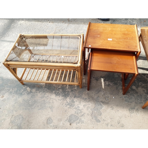 2886 - A RETRO TEAK NEST OF TWO TABLES AND BAMBOO COFFEE TABLE WITH GLASS TOP