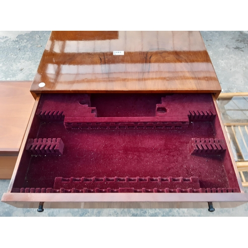 2886A - A MID 20TH CENTURY MAHOGANY CUTLERY CANTEEN ENCLOSING FOUR GRADUATED DRAWERS ON CABRIOLE LEGS WITH B... 