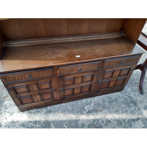 2888 - A REPRODUCTION DRESSER WITH GLAZED AND LEADED UPPER PORTION, 59